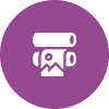 White icon of rolled-up prints or posters, with an image symbol on one sheet, centered on a purple circular background.