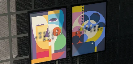 Two framed posters hanging on a dark wall, one reading “World Theatre Day” with an abstract, colorful face design, and the other reading “Cinema Day 2023” featuring geometric shapes including film reels and a ladder.