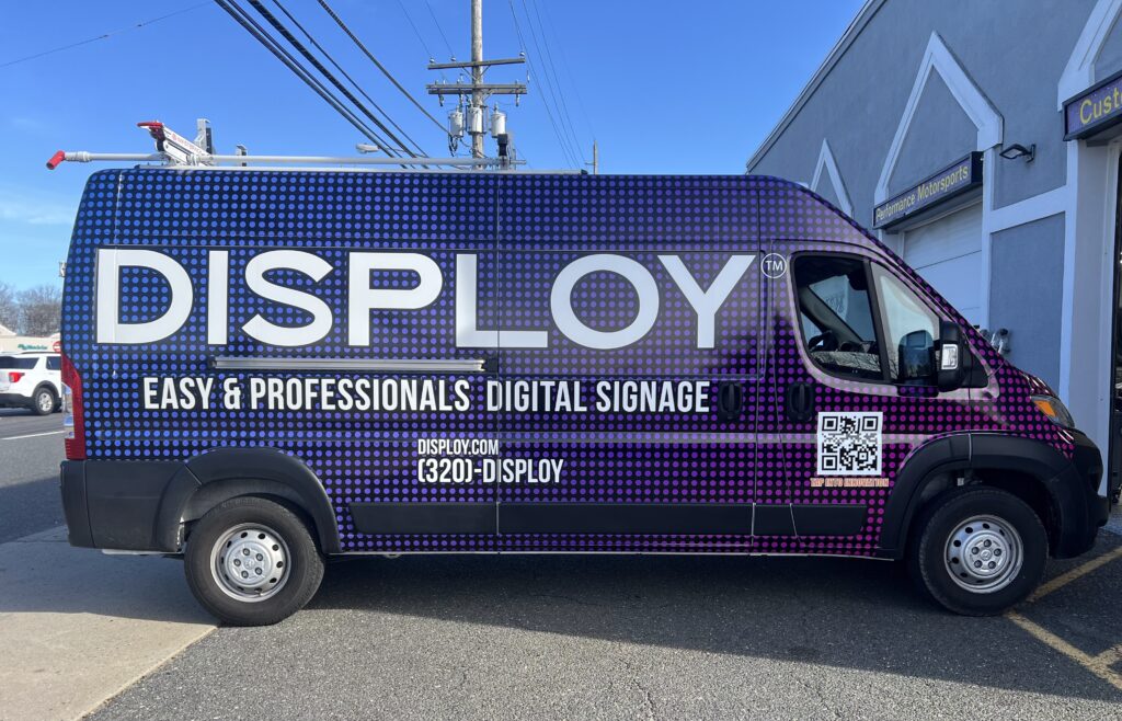 Commercial van fully wrapped with custom vinyl graphics by Prime Graphics Lab, showcasing bold branding and vibrant colors.