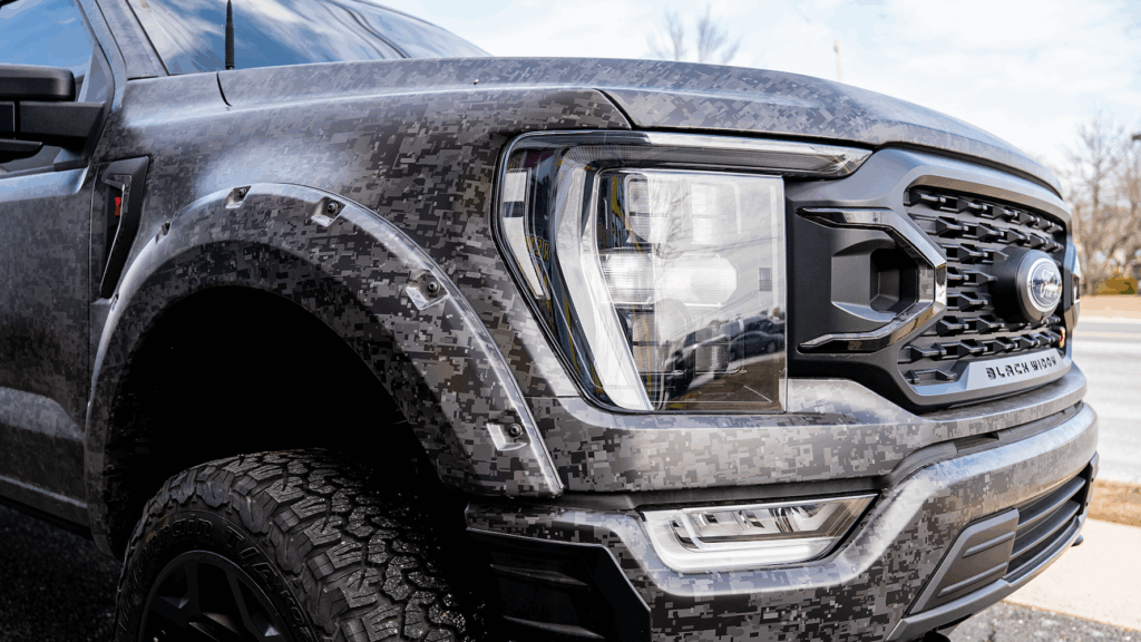 Ford pickup truck with a custom vinyl wrap, completed by the Prime Graphics Lab team, showcasing a sleek, professional design.