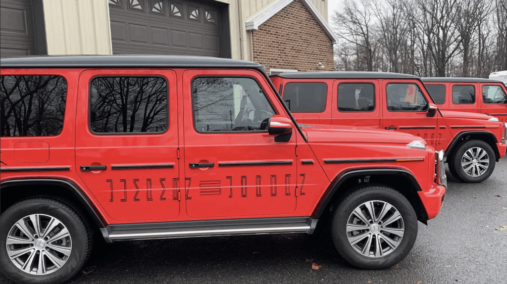 Multiple vehicles from a commercial fleet in East Brunswick featuring full vinyl wraps installed by Prime Graphics Lab.