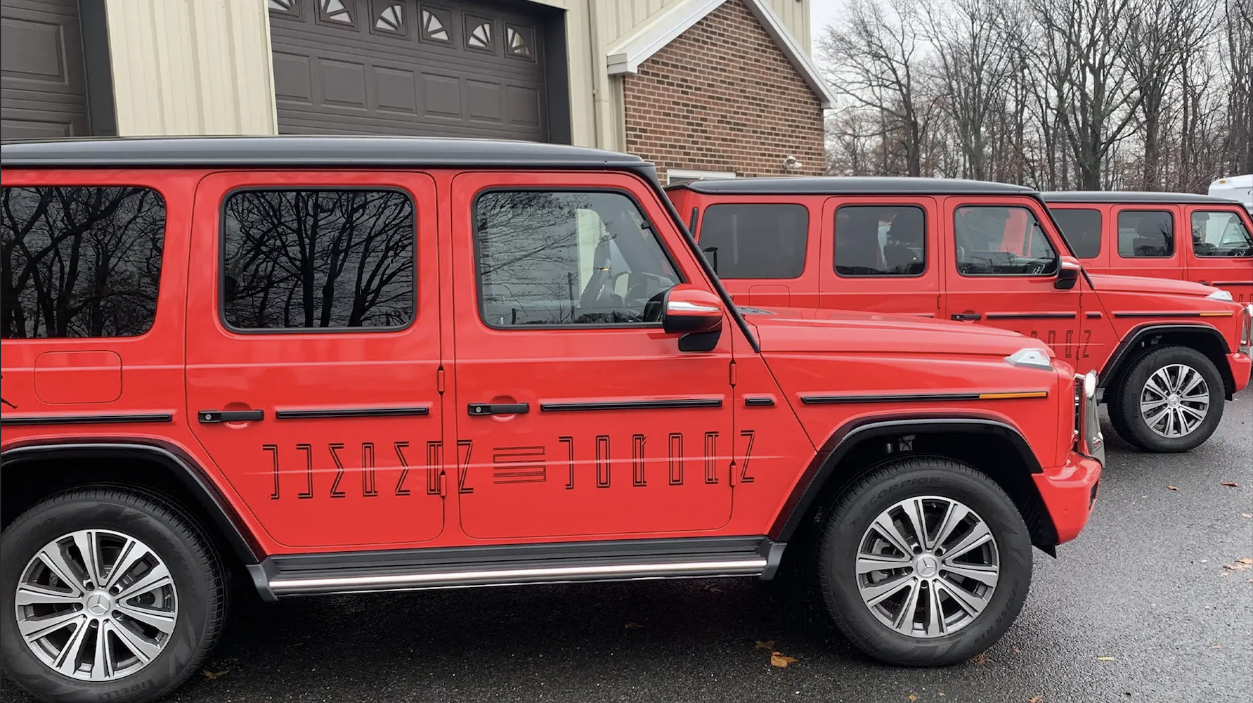 Multiple vehicles from a commercial fleet in East Brunswick featuring full vinyl wraps installed by Prime Graphics Lab.